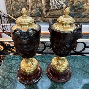 A Pair of Bronze  and BGriotte Marble Cassolettes after a model by Clodion
