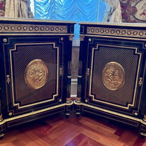 A Pair of Napoleon III Ebonized Wood Boulle and Bronze Mounted Meubles D'Appui
