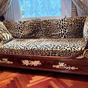 An Empire Style French Mahogany and Ormolu Mounted Day Bed or "Lit en Bateau"